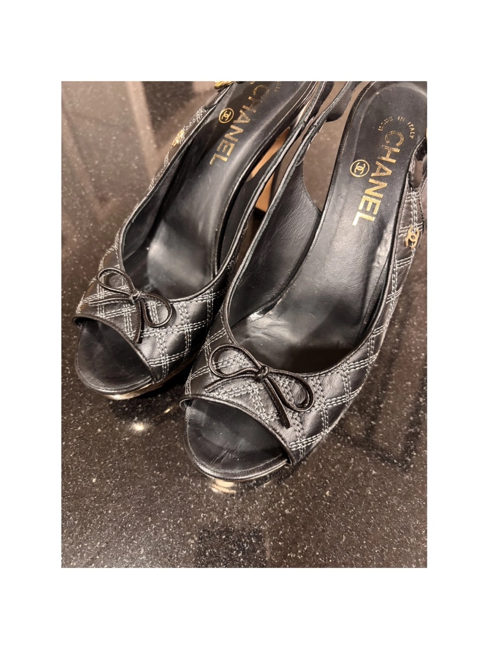 CHANEL Black Quilted Peep-Toe Slingback Heels with Bow